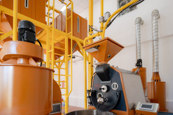 Overview of the Mars V5 AI automated coffee roasting production line with silos, loading pipes, and synchronized processing equipment